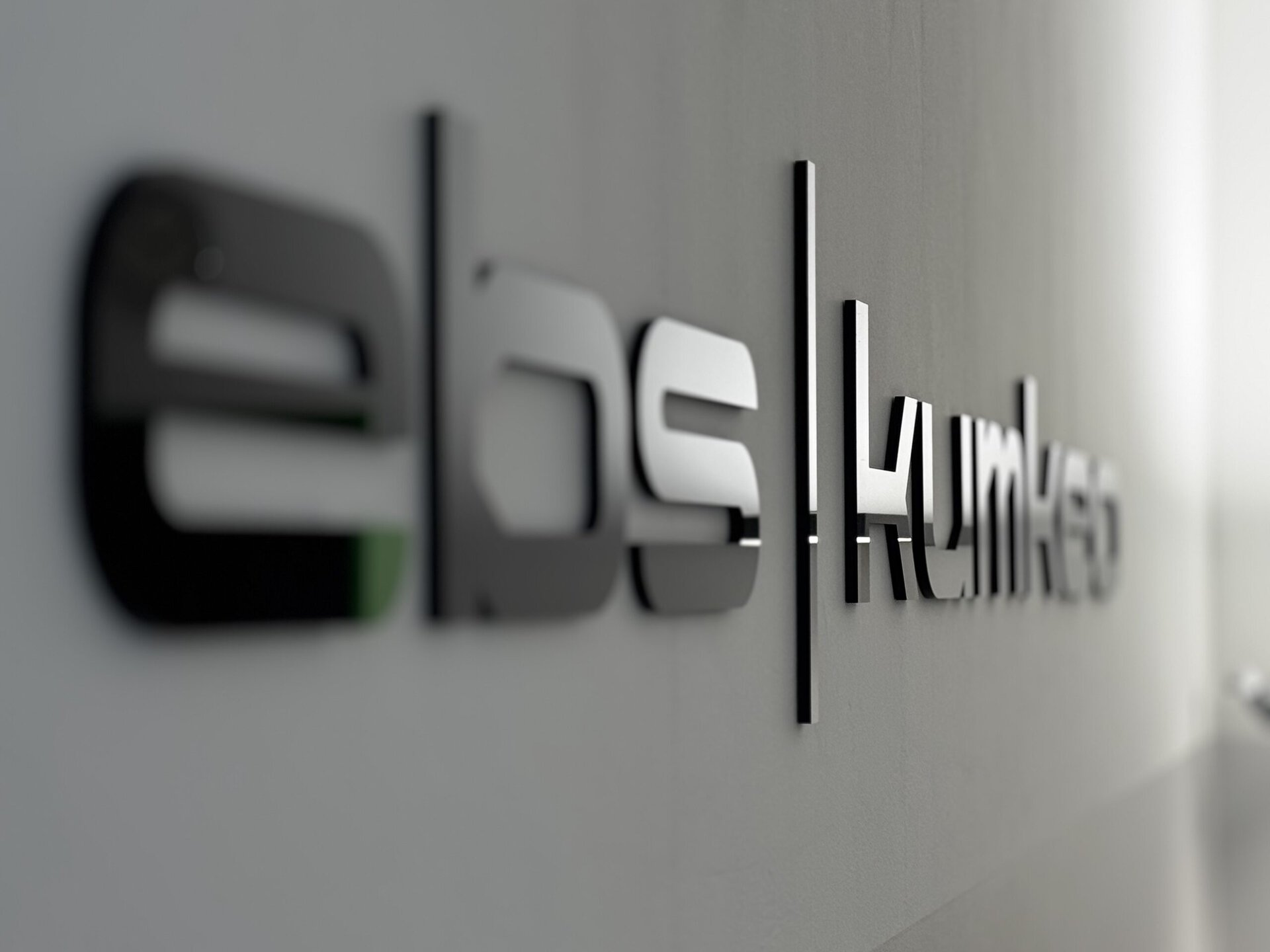 Close-up of a modern three-dimensional wall logo
